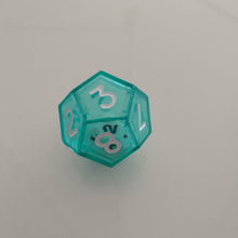 Load image into Gallery viewer, an example of a 12 sided double die (one smaller, opaque die within a clear, hollow die)
