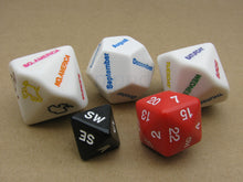 Load image into Gallery viewer, Image of the 5 dice outside their packaging.  The dice are a 14 sided die of the Continents (image of the continent and name on separate faces), a 12 sided die for Months, a 7 sided day for Days of the Week, an 8 sided die of Compass Directions, and a 30 sided die for the Days of the Month (apologies to the 31st).
