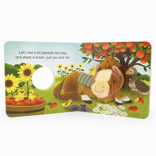 Load image into Gallery viewer, An open page of the book.  &quot;Let&#39;s rest a bit beneath this tree,/ and share a snack - just you and me.&quot; The horse and a duck sit under an apple tree. The meadow they sit in is lined with sunflowers, and in the foreground are purple pansies and white daises. Four ducklings play around the pages.  
