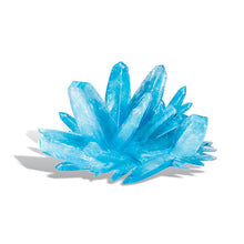 Load image into Gallery viewer, Picture of grown crystal; this is a kit we think will in fact grow quality crystals.  The sample image is blue, a pile rectangular prisms jutting out at all angles..
